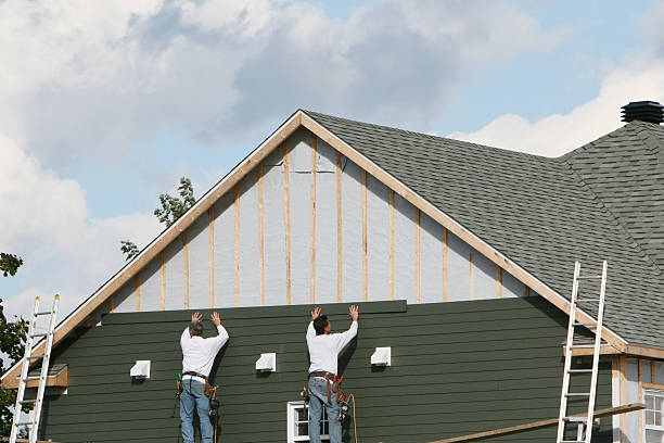 Professional Storm Damage Siding Repair technician working in Trevorton, PA